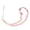 Guess Phone Strap Beads Shell - pendentif téléphone 25 cm (Rose)