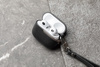 Moshi Pebbo Luxe - pouzdro na AirPods 3 s odnímatelným řemínkem na zápěstí (Charcoal Black)