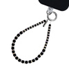 Crong Phone Charm Midnight Beads – stylowa zawieszka z czarnymi kamieniami i kryształami