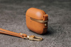 Moshi Pebbo Luxe - AirPods 3 case with detachable wrist strap (Caramel Brown)